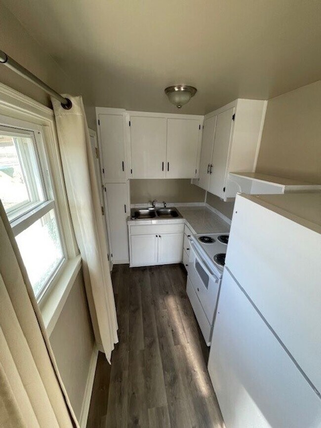 Building Photo - Coming soon! Charming 1-Bedroom Oasis with Modern Upgrades & Spacious Yard!