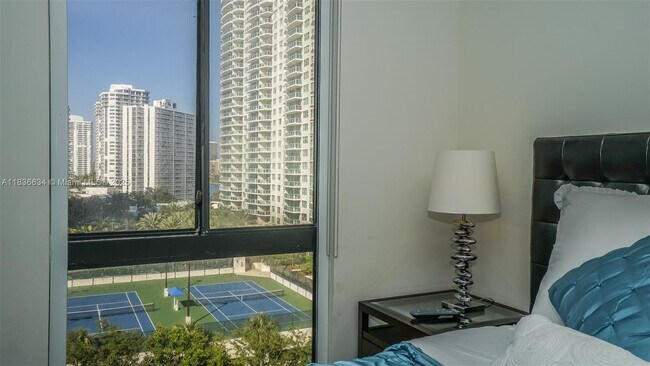 Building Photo - 20191 E Country Club Dr