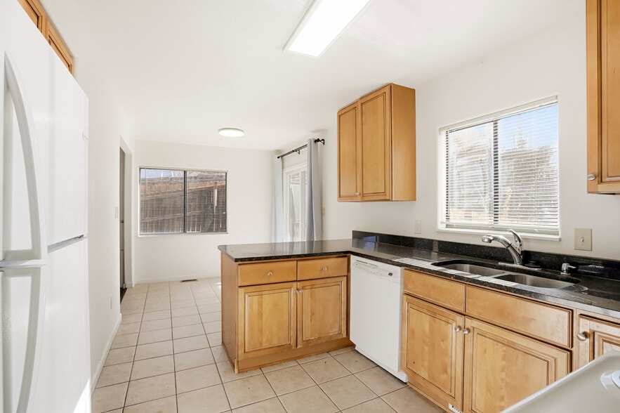 Kitchen facing eating area - 256 W Jefferson Ave