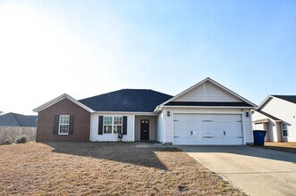 Building Photo - Coming Soon-4 Bedroom 2 Bathroom, Small Pets Considered