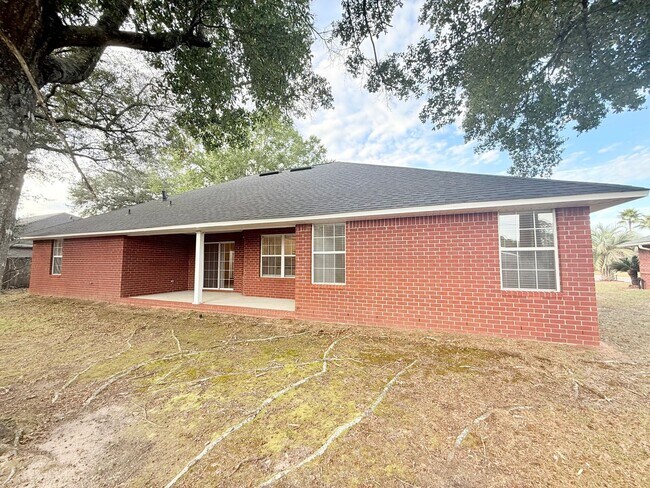 Building Photo - Spacious 4-Bedroom, All-Brick Home
