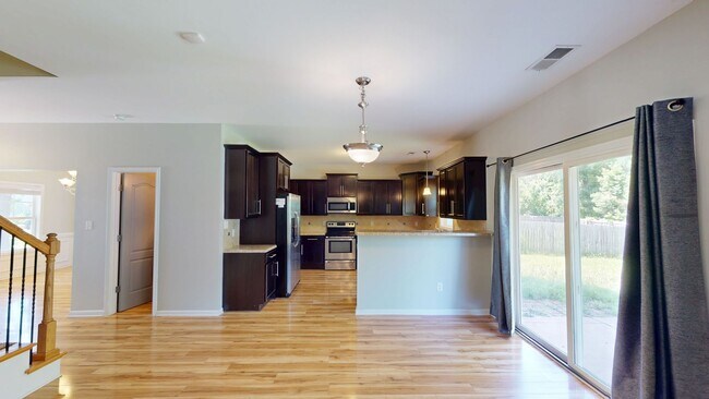 Building Photo - Updated 3 Bedroom, 2.5 Bathroom 2-Story w/...
