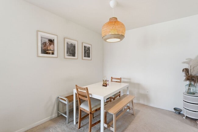 Building Photo - Bathed in natural light, this stunning second level condominium offers an effortless blend of com...