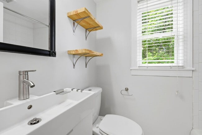 Building Photo - Updated 2BR Condo | Walk to Village District + Private Deck!