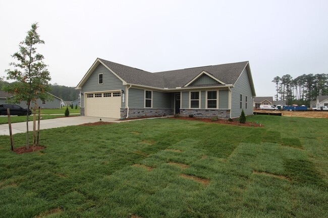 Primary Photo - Maintenance Free Living in this Brand New ...