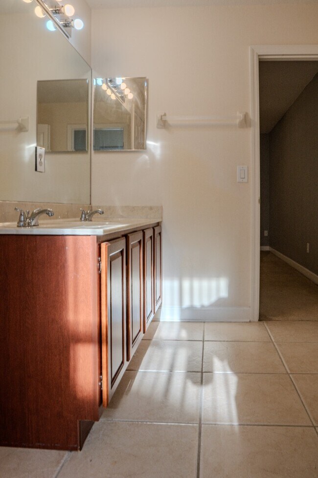 Building Photo - Spacious 5BR Home in Falcon Trace | 3-Car Garage | Screened Patio | Resort-Style Amenities Rent: ...