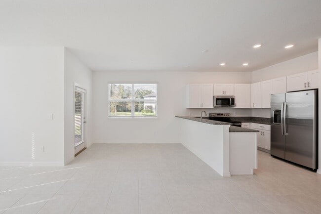 Building Photo - Brand New End Unit Townhome in Angeline Co...