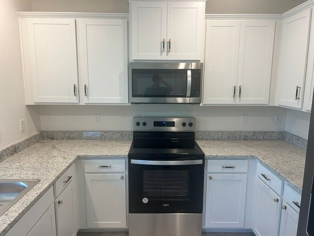 Building Photo - 12152 SW RIMINI Way