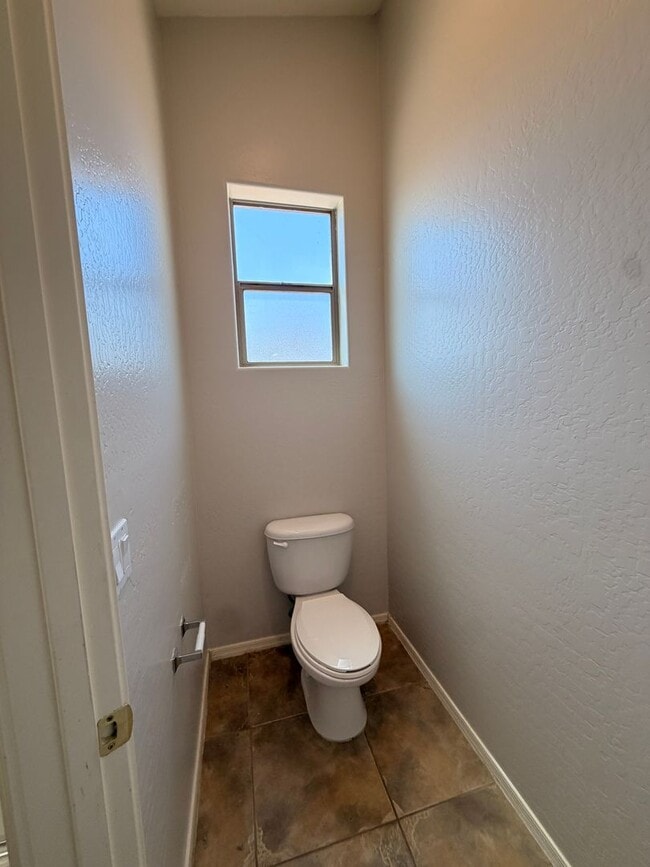 Building Photo - *NEW* Custom Paint/*NO* Carpet 3 BD/2 Bath Spacious Surprise Home!