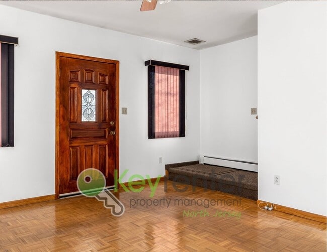 Building Photo - Spacious 2BR / 2.5BA Home with Huge Deck, Private Yard & Parking for 6