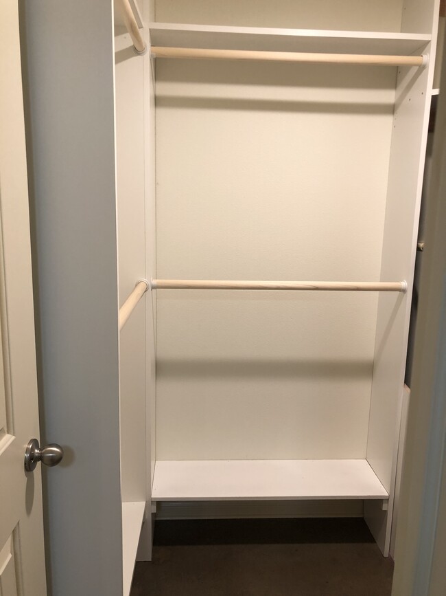 Customizable built-ins in bedroom walk-in closet - 6315 NE 36th Ave