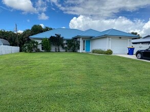 Building Photo - 3196 SW Areca Dr