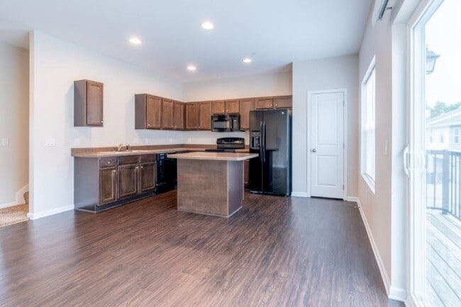 Building Photo - Huge, Open Floor Plan Townhome for RENT at Johnston Common Brownstones!