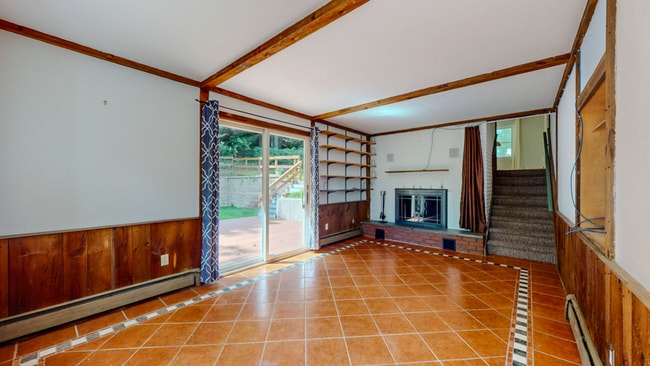 Building Photo - Spacious 3-Bedroom Split-Level with Firepl...