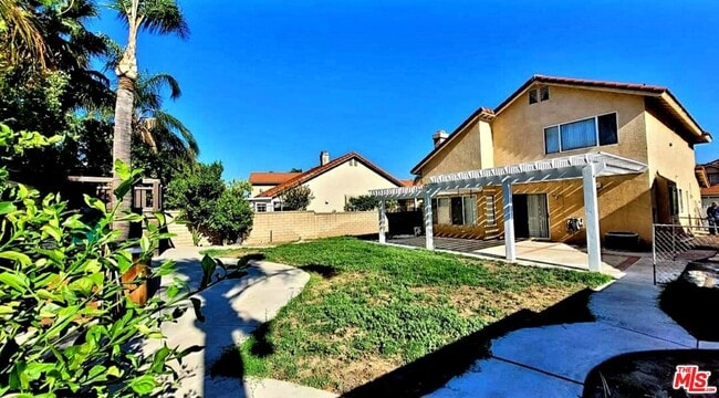 Building Photo - 15180 Carnation St