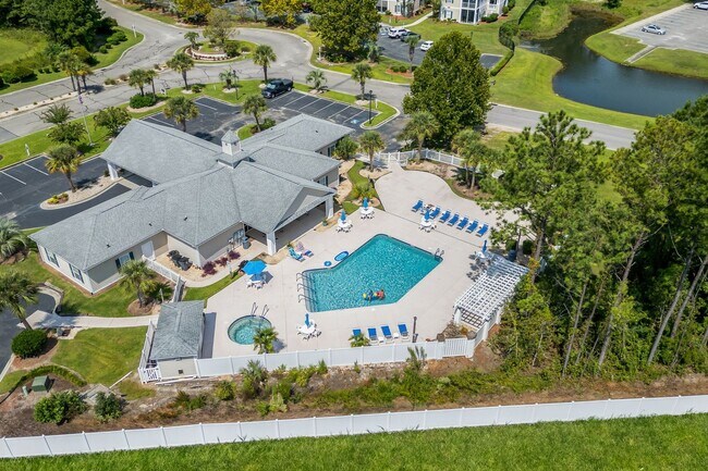 Building Photo - Modern 4BR Home with Screened Porch & Pond Views | Sun Colony, Longs SC
