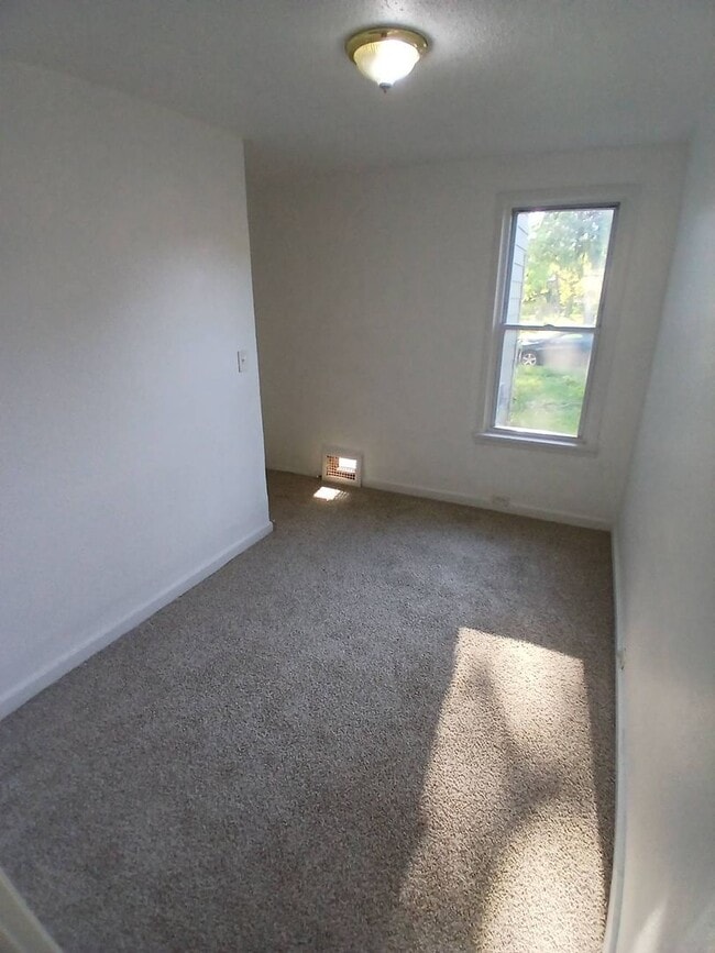 Building Photo - Newly Renovated 4BR/1BA Single-Family Home with Garage – Cleveland