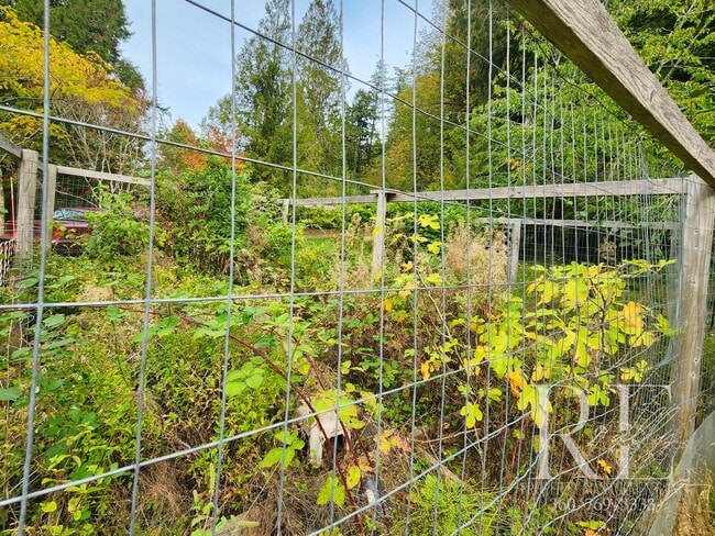 Building Photo - Waterfront Tudor | Private, Vintage Charm with Casita