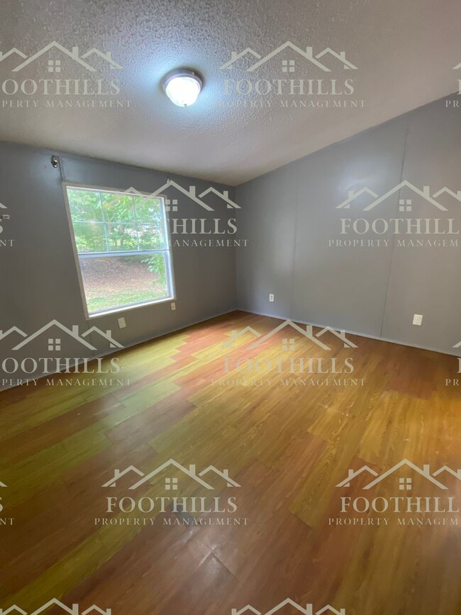 Building Photo - Spacious 4-Bedroom Double-Wide Mobile Home...