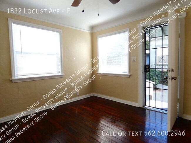 Building Photo - CHARMING 1 BEDROOM 1 BATHROOM UNIT LOCATED...