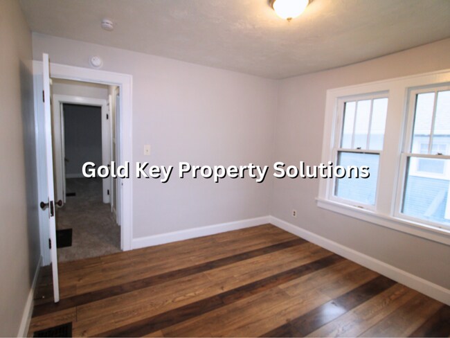 Building Photo - Large 2 BR 1 BA House with Family Room, Basement, Garage, and Separate Storage Building (SECTION ...