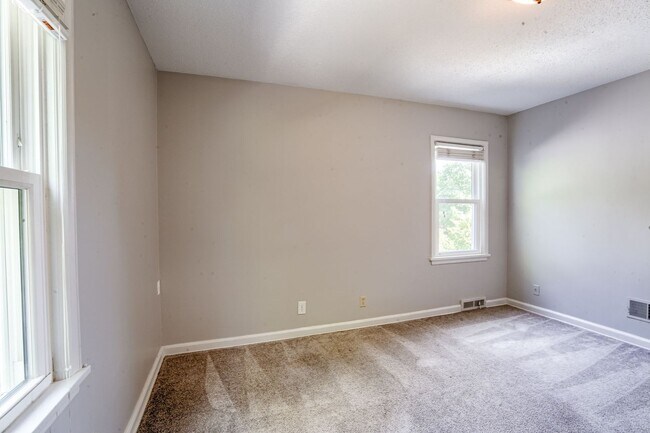 Building Photo - A Home With Character Walking Distance To ...