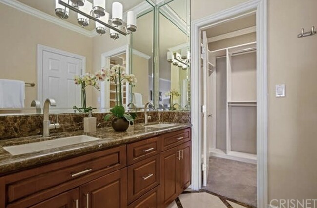 Master bedroom with walk-in closet. - 1909 Pelham Ave