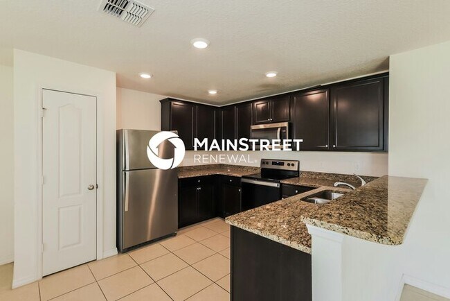 Building Photo - 4 Bedroom Pet-Friendly Home in Lakeland, FL with Main Street Renewal