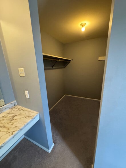 Top Level: walk-in closet master bedroom - 12319 Bonfire Dr