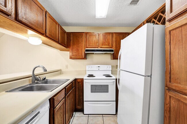 Building Photo - Stylish Two-Story Condo in the Heart of th...