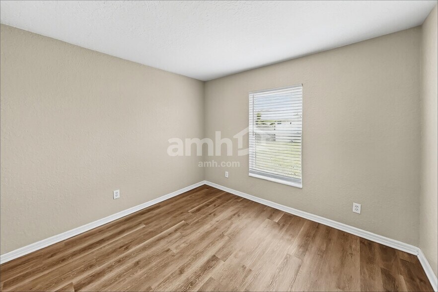 Building Photo - 3965 SW Laffite St
