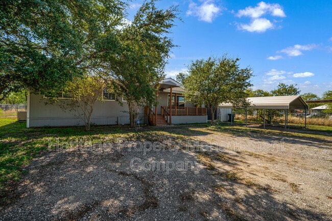 Building Photo - 7590 New Sulphur Springs Rd