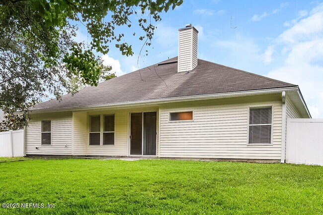 Building Photo - 7068 Rapid River Dr W