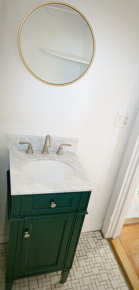 vanity/faucet/mirror - 262 Pleasant St