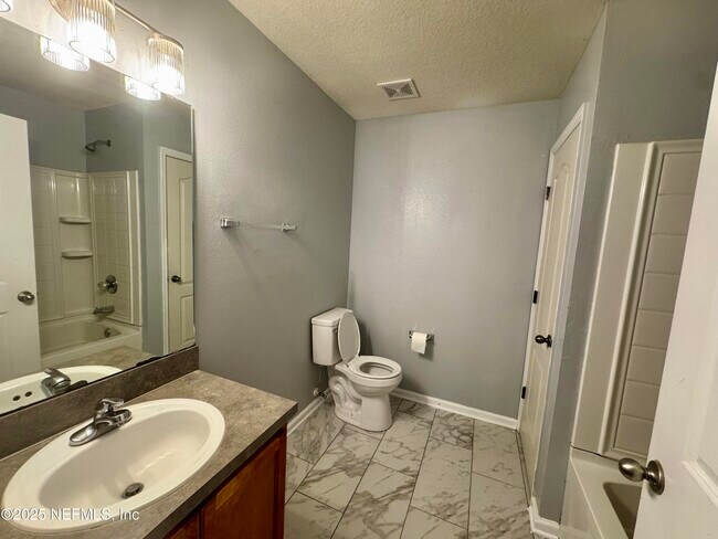 Building Photo - 11690 Brian Lakes Dr N