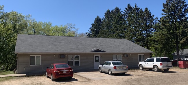 Each of the 4 units has 2 bedrooms / 1 full bath. Large living rooms and tiled kitchens. In unit AC. Building offers 2 complete laundry rooms. Off-street parking. Garbage included. - 316 3rd Ave W