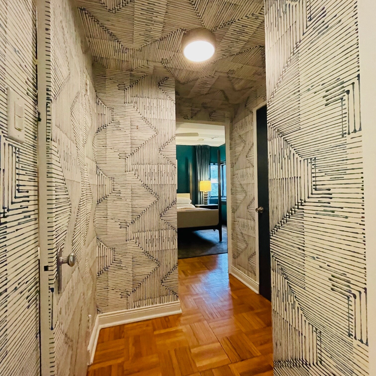 Hallway between main living space and bedroom -- custom designer wallpaper - 5048 N Marine Dr