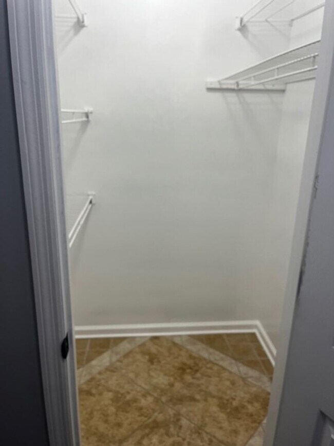 Building Photo - Charming All-Brick Corner Lot Home with Hot Tub & Fenced Yard