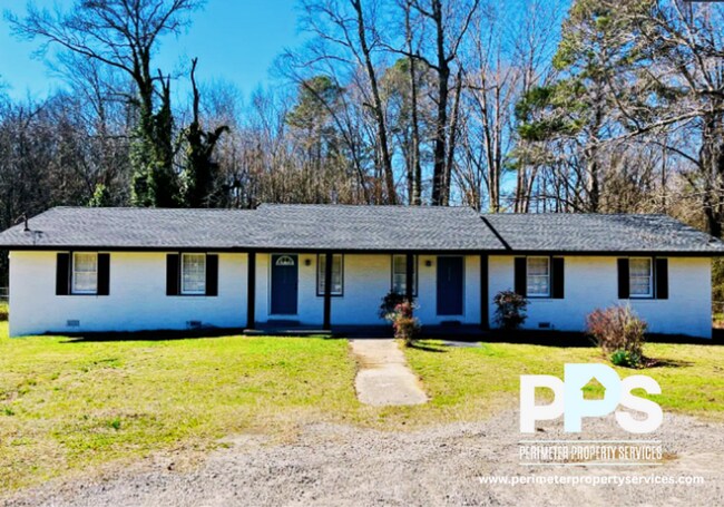 Building Photo - 6127-6129 E Fayetteville Dr