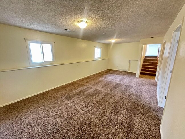 Building Photo - 4 Bed, 2 Bath Loveland, CO Home- Fenced Backyard, A/C, & 2 Car Garage!