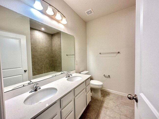 Building Photo - This amazing 4 bedroom, 2 bathroom single ...