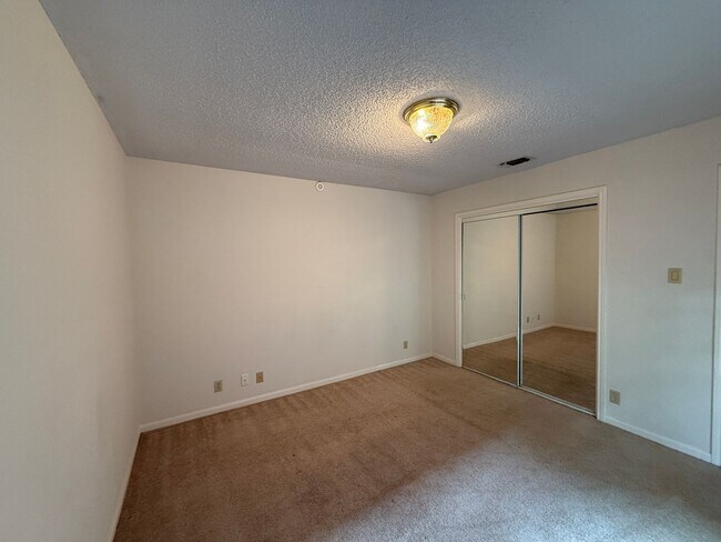 Building Photo - NEAR GOLF COURSE - WELL ESTABLISHED SPICEW...