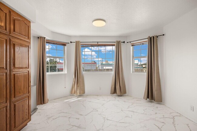 Building Photo - 1209 Paisano St NE