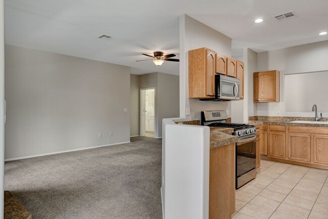 Building Photo - Modern 3 Bedroom Condo within a Gated Comm...