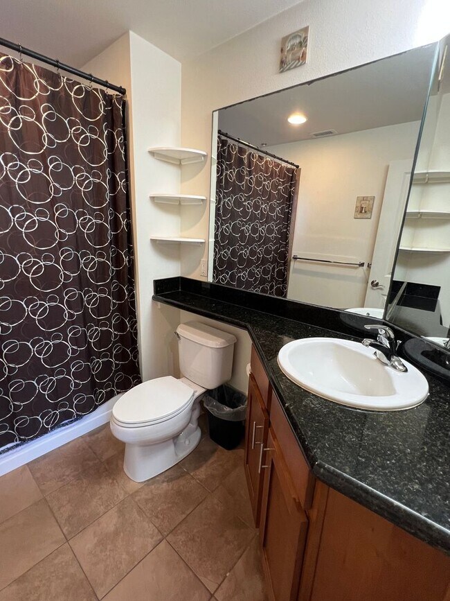 Building Photo - Top-Floor Ocean View Condo Across from the Beach | Furnished 2BR + Central A/C