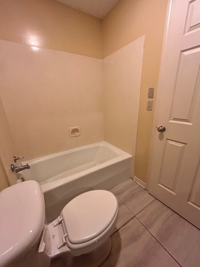 Building Photo - W/S/T included! Dbl garage! 2BR/2.5BA with...