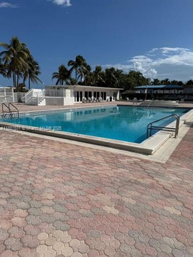 Building Photo - 5005 Collins Ave
