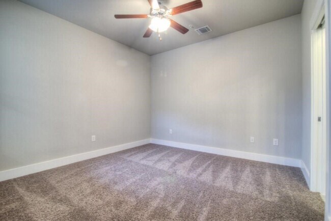 Building Photo - 7411 Pantherpaw St