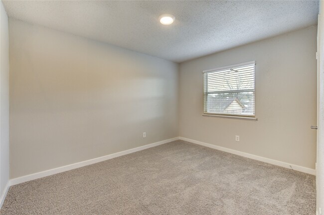 Building Photo - 7411 Trabajo Dr