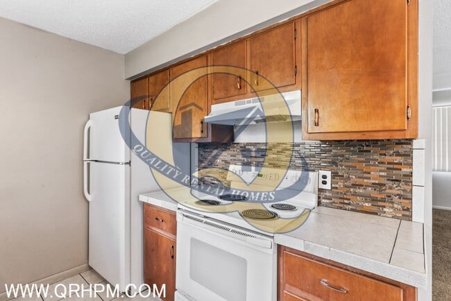 Building Photo - Available Now! Carmen Ainsworth Schools - Water included - SIDE BY SIDE DUPLEX